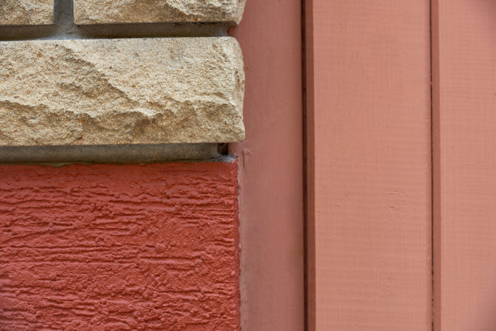 Exterior stucco painting on a residential property
