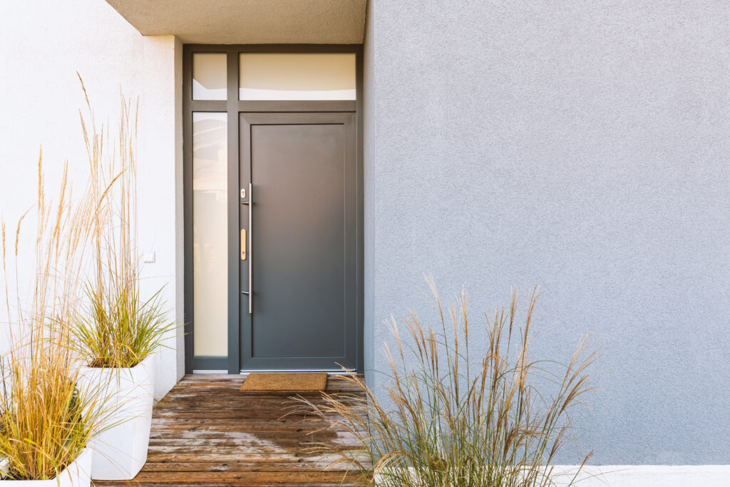 New stucco installation on a residential exterior