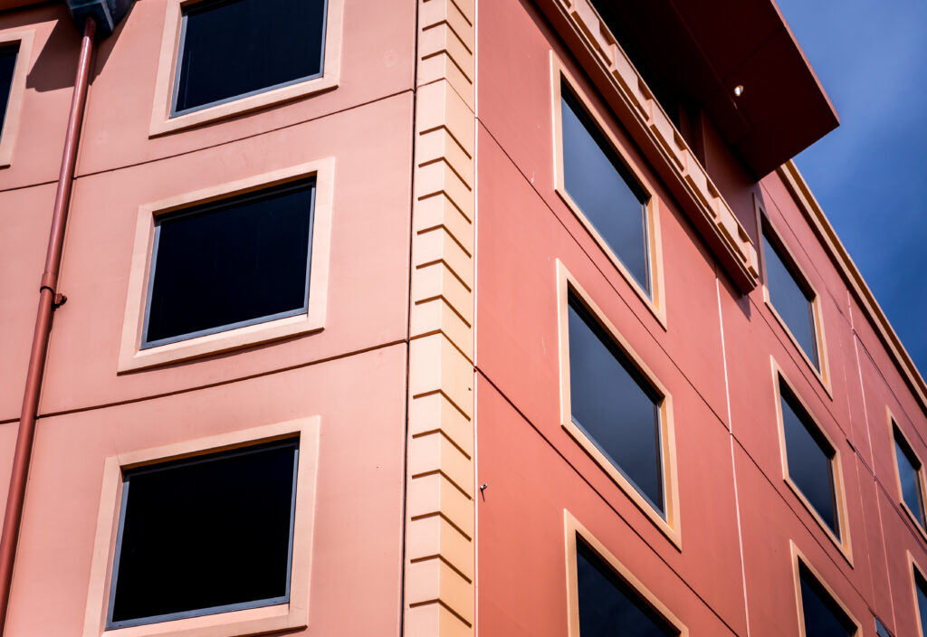 Commercial exterior stucco installation on a building